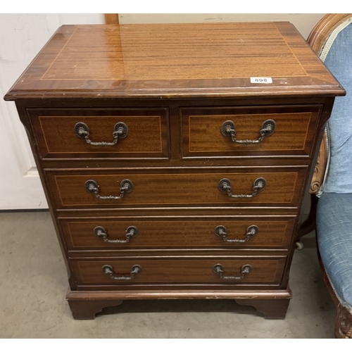 898 - A small mahogany two over three chest of drawers.