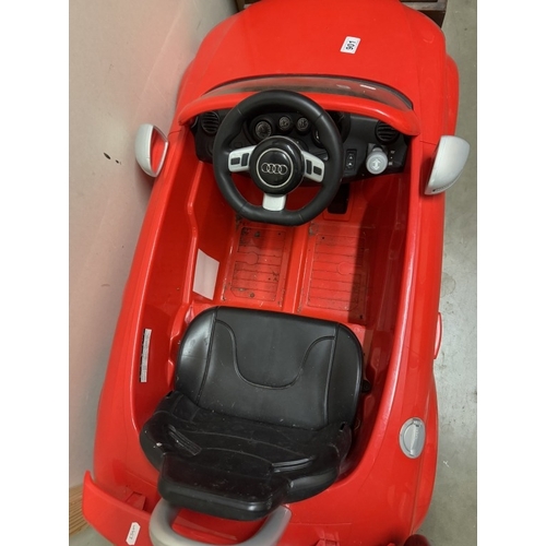 901 - A Childs Audi RS TT Plus electric sit in car (Needs battery & leads)