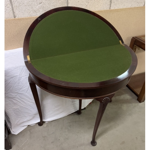 905 - A Victorian mahogany 'D' shaped fold over games table.