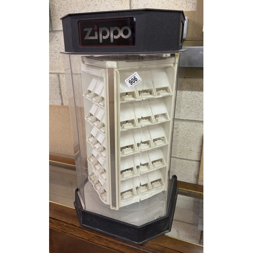 906 - A shop display cabinet for Zippo lighters.