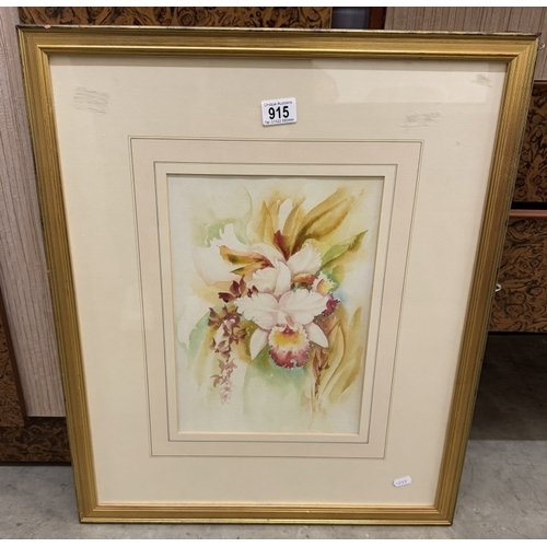 915 - A framed and glazed still life watercolour of flowers.