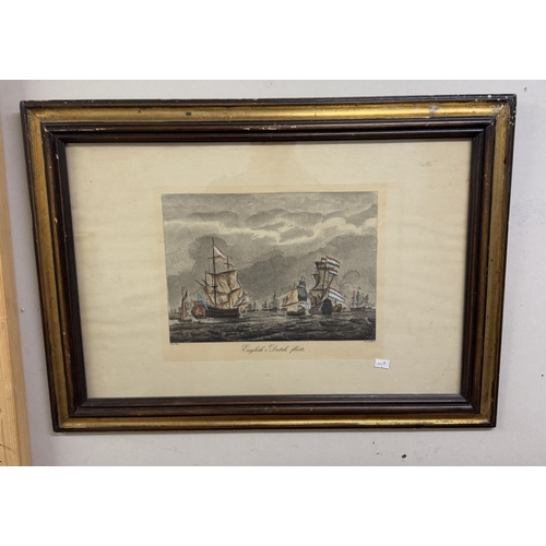 925 - A pair of framed and glazed prints featuring Dutch and English fishing boats.