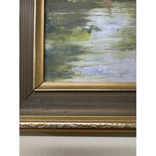 927 - An oil on board river scene signed Gwen Davis, 56 x 58 cm.