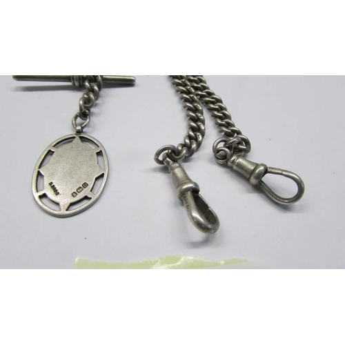 1050 - A hall marked silver watch chain with fob, 42.52 grams.