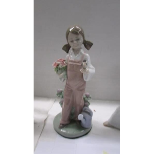 1054 - Four boxed Lladro figures.