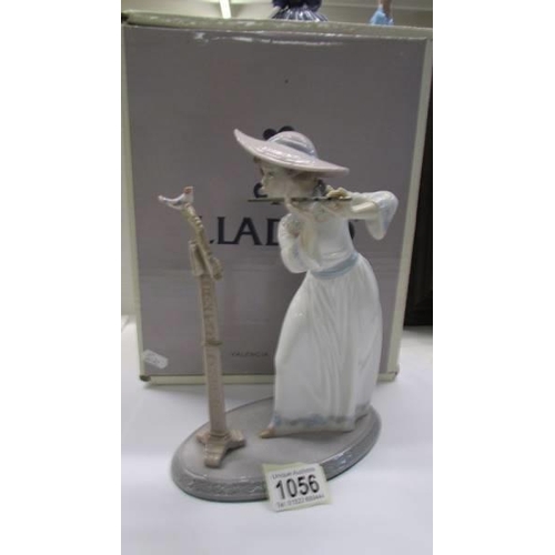 1056 - A boxed Lladro figure - Songbird.