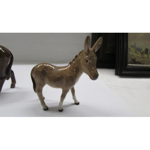 1066 - Two Beswick donkeys.