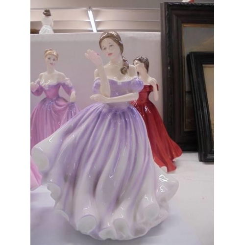 1208 - Five Royal Doulton figurines including Message of Love.