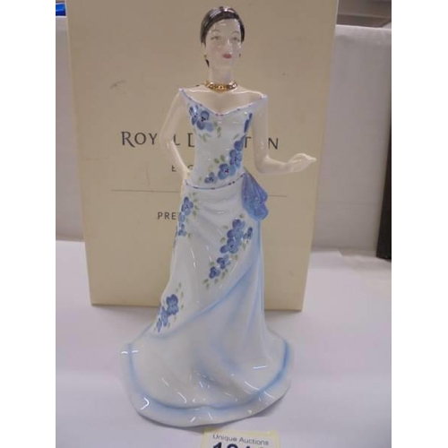 1216 - A boxed Royal Doulton Charlotte figurine.