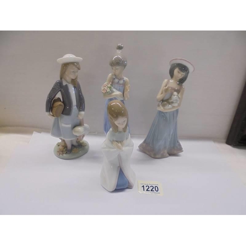 1220 - Four boxed Lladro figurines.