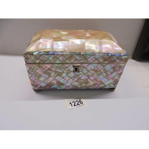 1226 - A 19th century mother of pearl tea caddy, lid is loose.