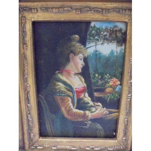 1228 - A gilt framed enhanced print of a lady.