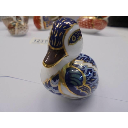 1231 - Five Royal Crown Derby bird paperweights with silver stoppers and a Royal Crown Derby blue tit dish.