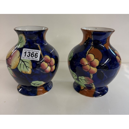 1366 - A pair of Court ware peach bloom vases