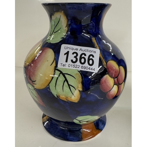 1366 - A pair of Court ware peach bloom vases