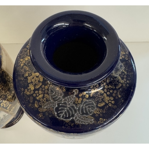 1370 - A pair of Japanese Satsuma vases on cobalt blue ground