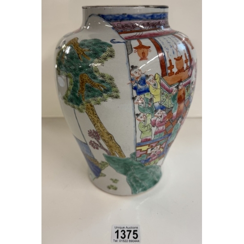 1375 - A Chinese Famille rose vase with oriental people pattern