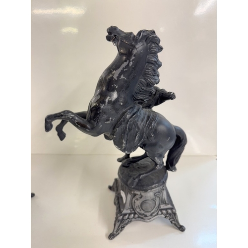 1379 - A pair of spelter Marley horses