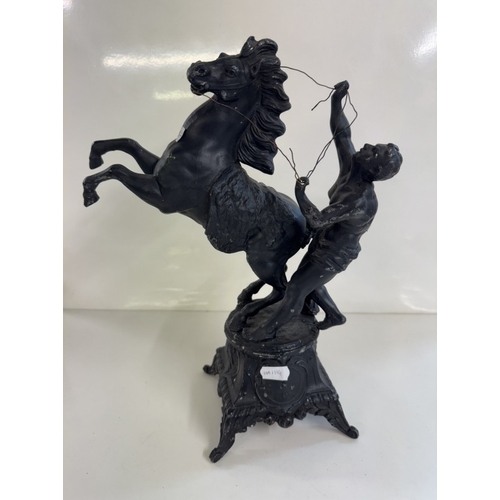 1379 - A pair of spelter Marley horses