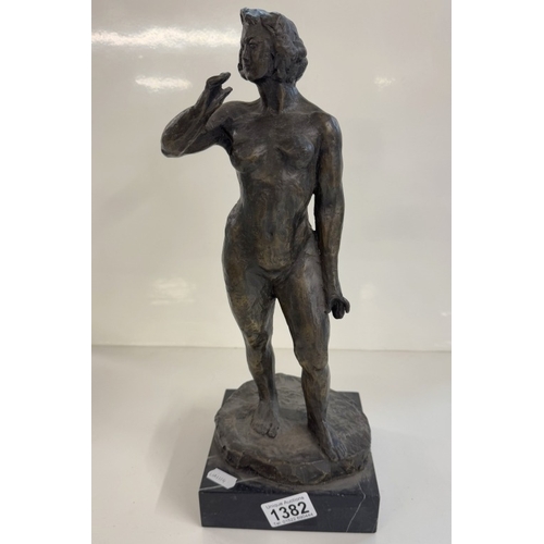 1382 - A bronze figure of a female nude.