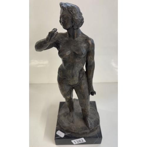 1382 - A bronze figure of a female nude.