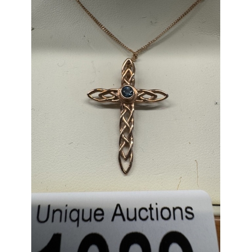 1089 - A Clogau stone set gold cross on chain, 3.6 grams.