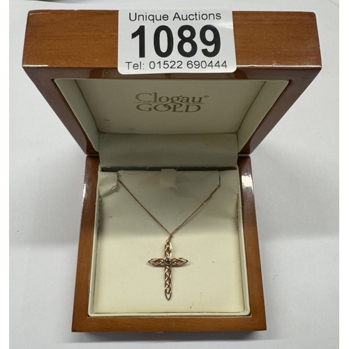 1089 - A Clogau stone set gold cross on chain, 3.6 grams.