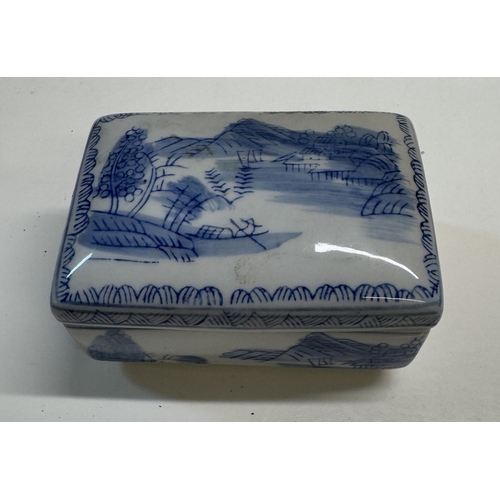 1243 - A quantity of oriental/Chinese pottery & blue & white including jars & containers