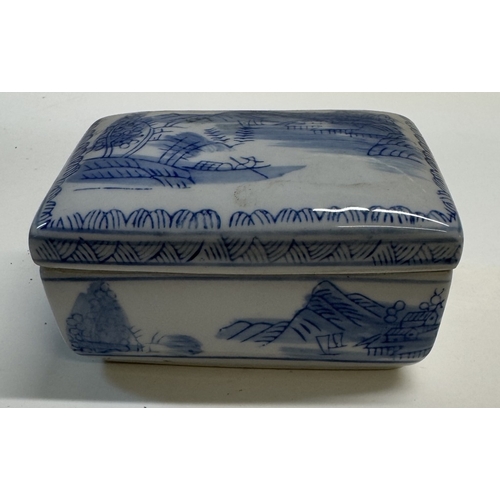 1243 - A quantity of oriental/Chinese pottery & blue & white including jars & containers