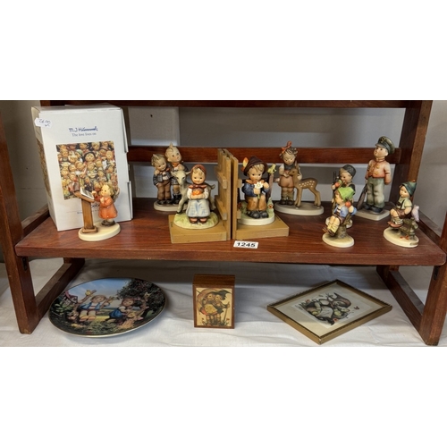 1245 - A collection of Hummel/Goebel items including figurine book ends, 7 figurines & plate box etc.