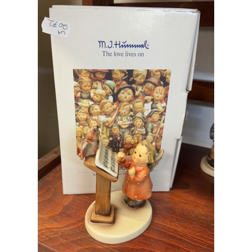 1245 - A collection of Hummel/Goebel items including figurine book ends, 7 figurines & plate box etc.