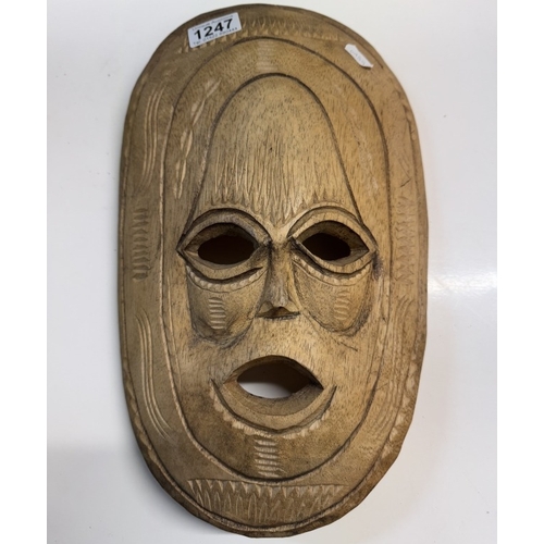 1247 - A carved wood tribal mask