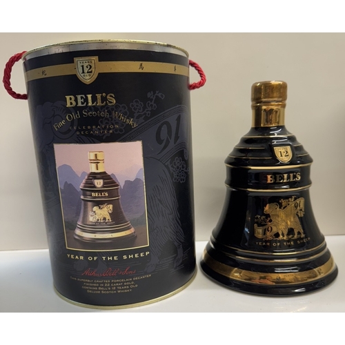 1249 - 2 rare boxed Bells Whisky decanters, Hawaii 12 years old deluxe whiskey & year of the sheep 1991