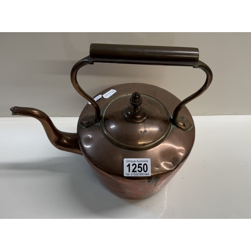 1250 - A Victorian copper kettle with dove tail joints