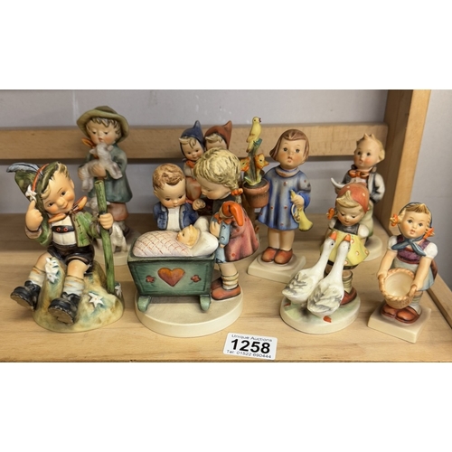 1258 - 8 Hummel figurines including Blessed Event