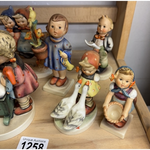 1258 - 8 Hummel figurines including Blessed Event