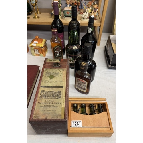 1261 - A quantity of whiskey & alcohol including Bushmills, Black Bottle etc.