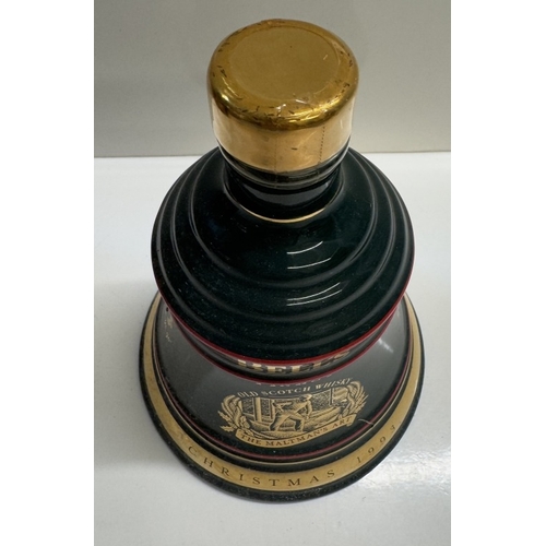 1264 - 3 boxed Bells whiskey decanters, all full, Christmas 1993, 1994 aged 8 years & 1995 aged 8 years