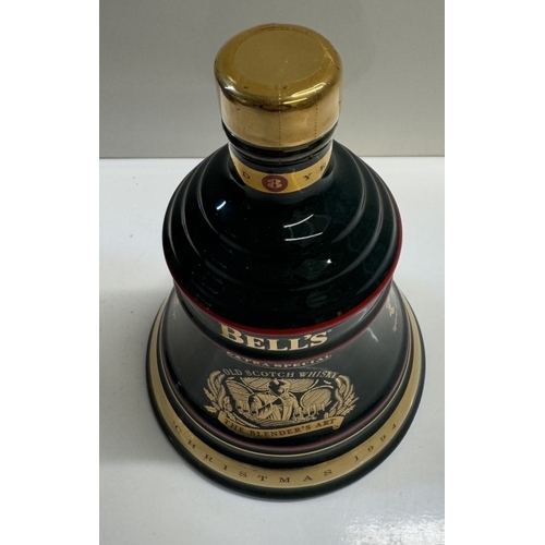 1264 - 3 boxed Bells whiskey decanters, all full, Christmas 1993, 1994 aged 8 years & 1995 aged 8 years