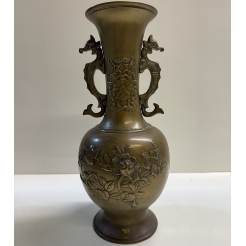 1268 - A pair of bronze urns