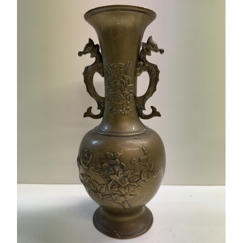 1268 - A pair of bronze urns