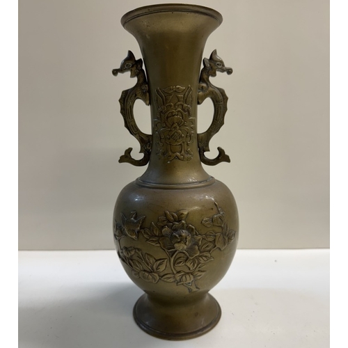 1268 - A pair of bronze urns