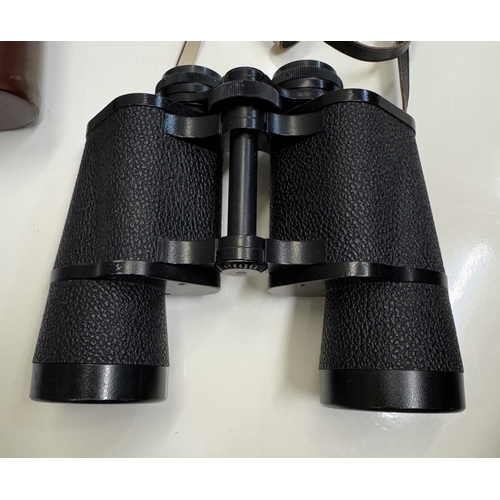 1307 - A cased Carl Zeiss Jena Jenoptem 10x50W binoculars