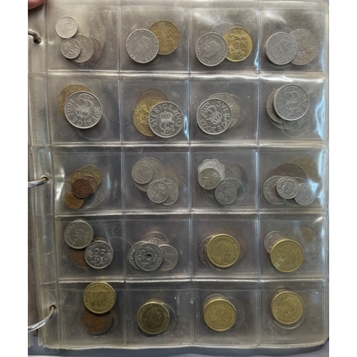 1126 - An album of world coins