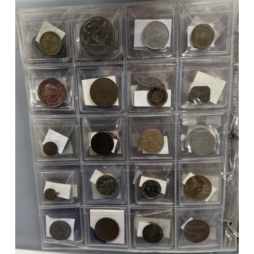 1126 - An album of world coins