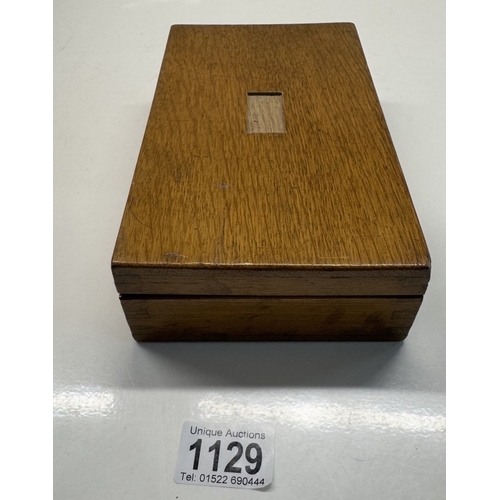 1129 - An oak cased maths set