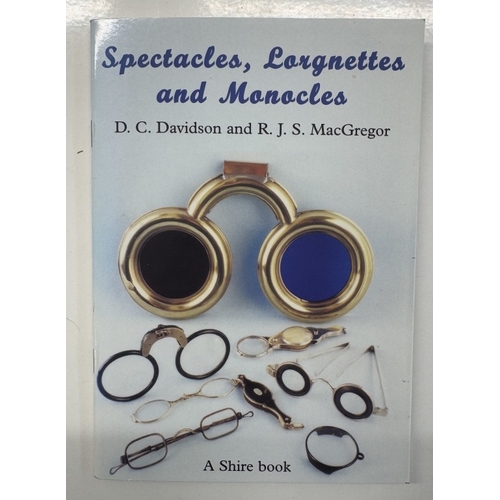 1133 - A 4 drawer cabinet of vintage & other spectacles, Lorgnettes & monocles etc.