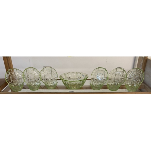 1141 - A vintage set of uranium glass fruit bowl with 6 matching dishes & 6 saucers