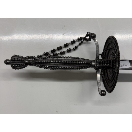 1147 - A steel court sword with beaded hilt & facetted studded decoration.