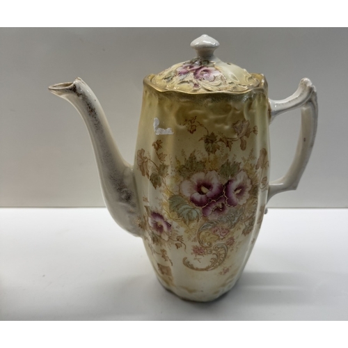 1151 - An early 20th century floral pattern coffee pot, sugar bowl & 1 other item